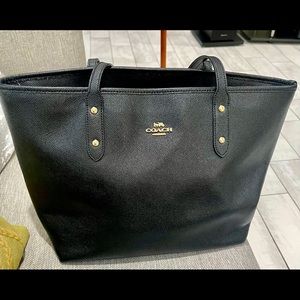 Lightly used Black Coach Leather Tote. Perfect for work or casual outings